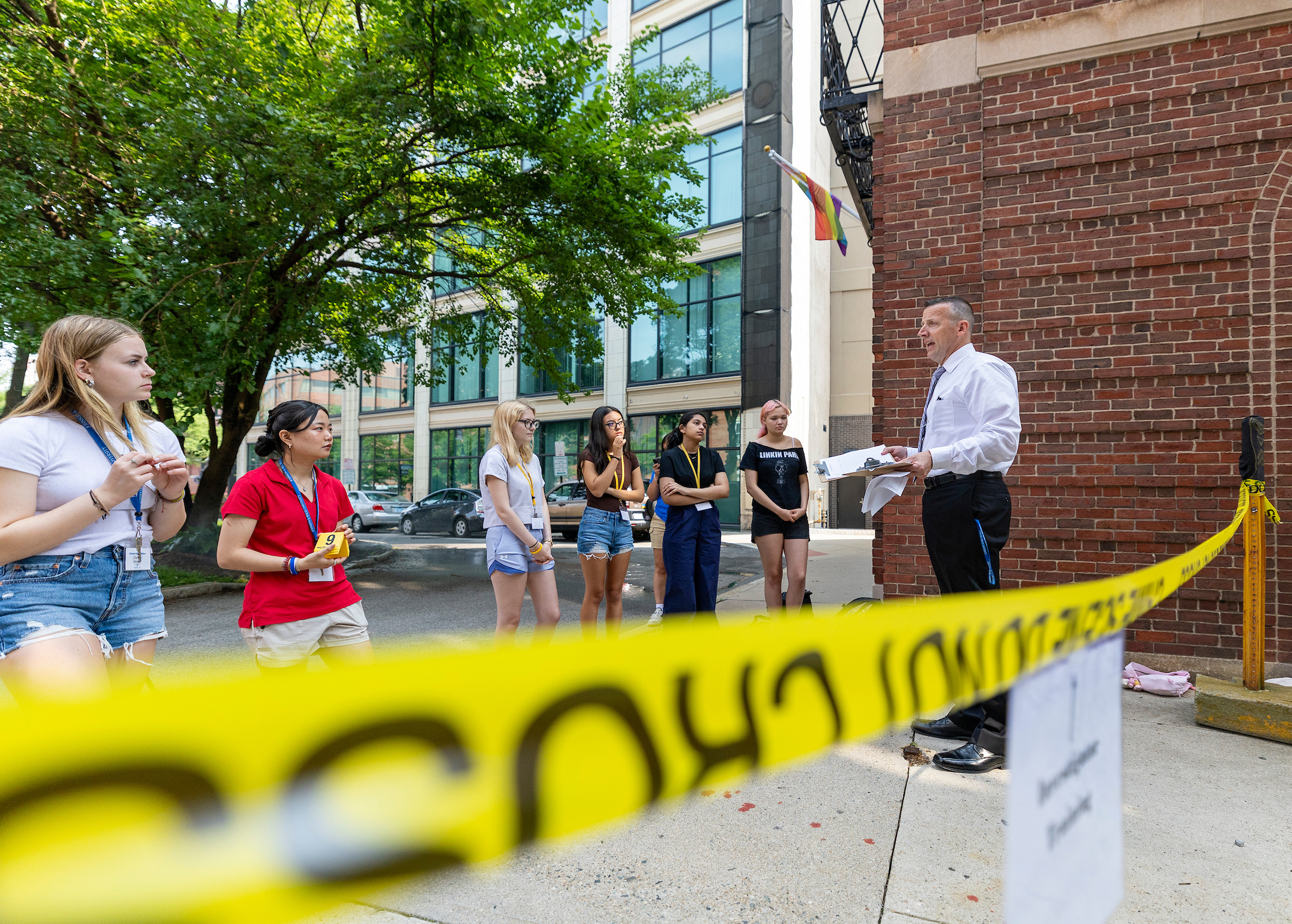 Stephen Riccitelli, Lecturer walks high school students in in a mock crime scene exercise on Saturday, July 26, 2025, as part of the Career Explorations program at Johnson 