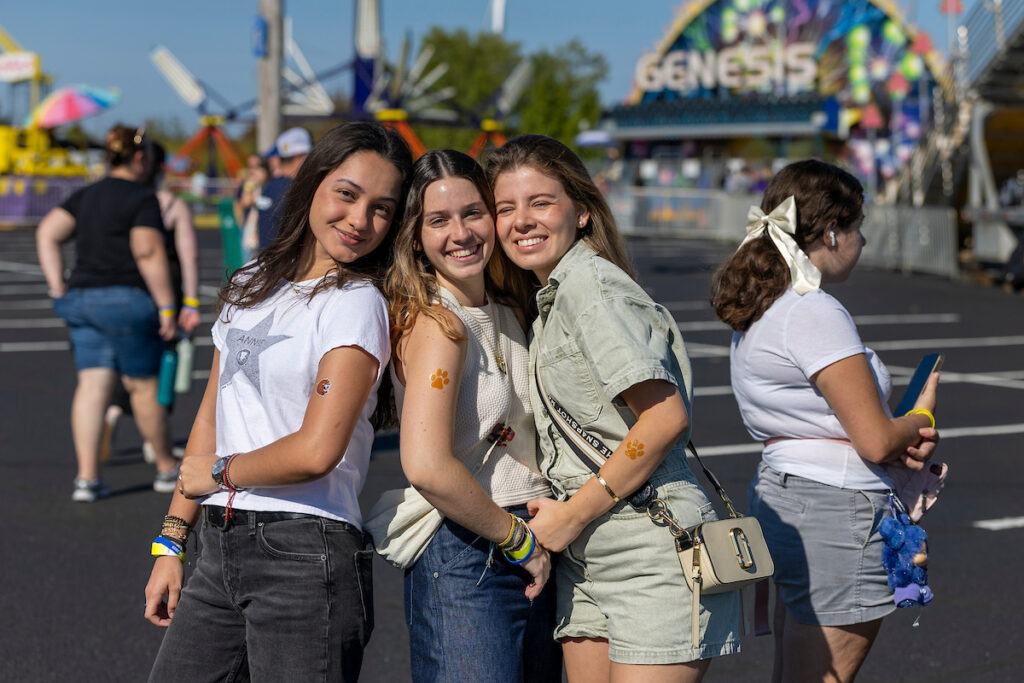 Female students enjoying homecoming events