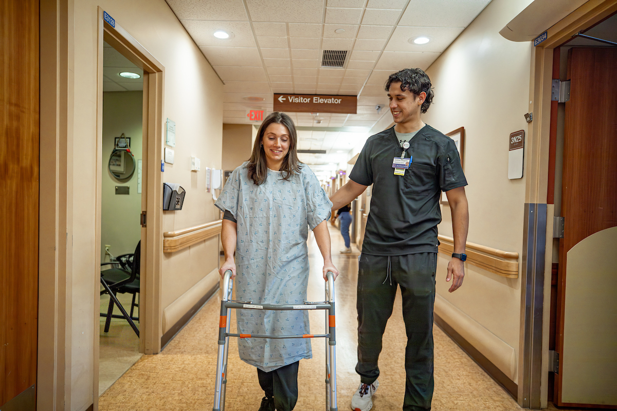 Intern student helps a patient at Miriam Hospital