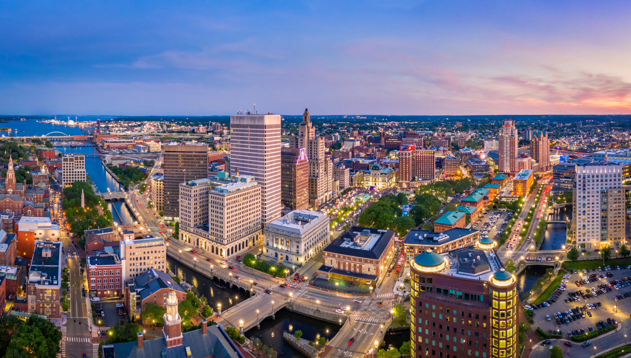 Aerial panorama of Providence skyline at dusk.