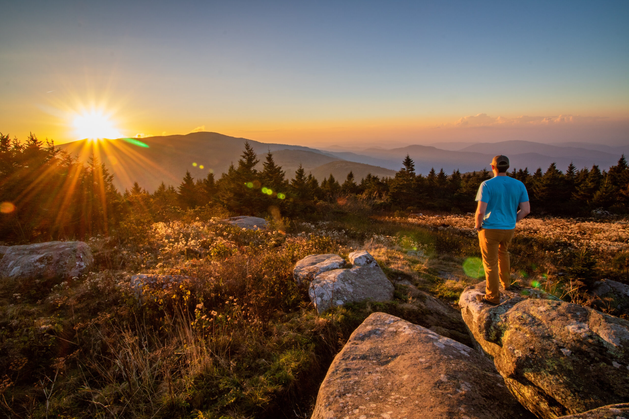 Student hiking a trail in the Blue Ridge Mountains