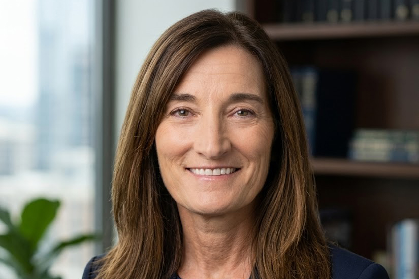 A portrait of a person smiling. 