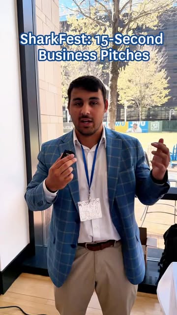 student with tiny mic speaking to camera