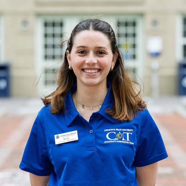 Maria Garcia, a 2025 Collegiate Ambassador Team (CAT) member, poses for a portrait outside McNulty Hall, Wednesday, May 21, 2025