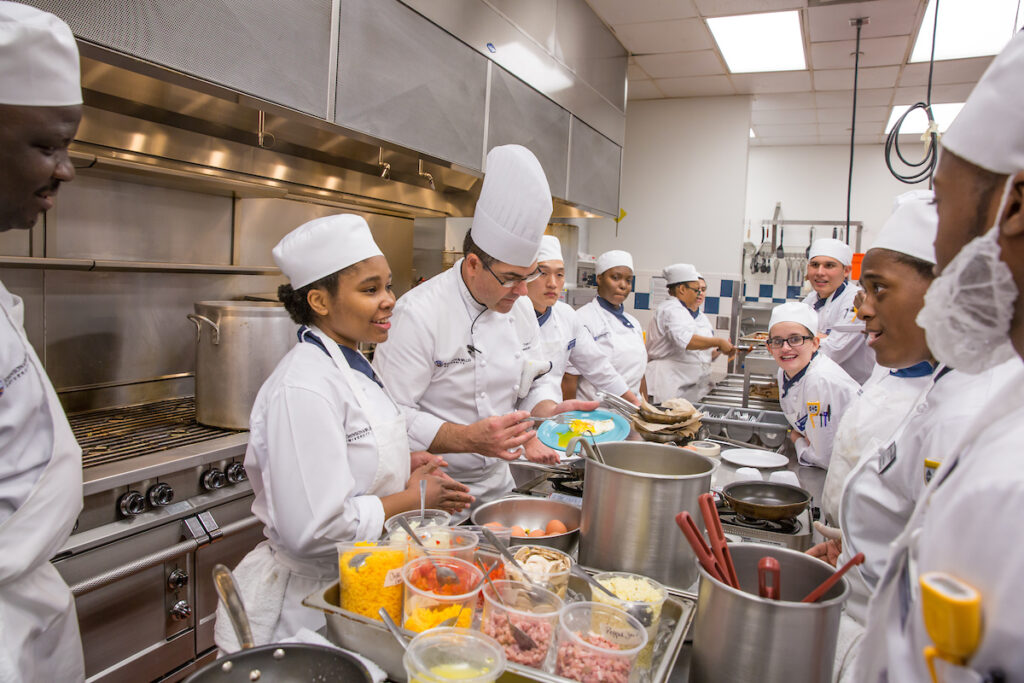 JWU culinary students attending class