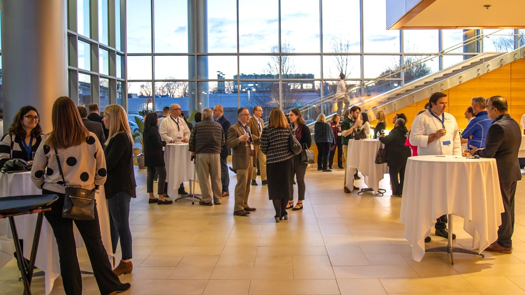 A gathering at the CCCE building on Harborside Campus during the 2023 FIT Symposium