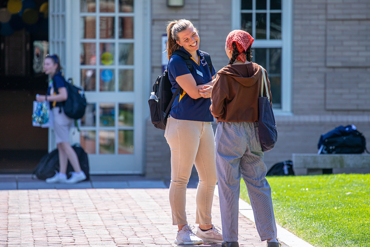 students chatting outside 
