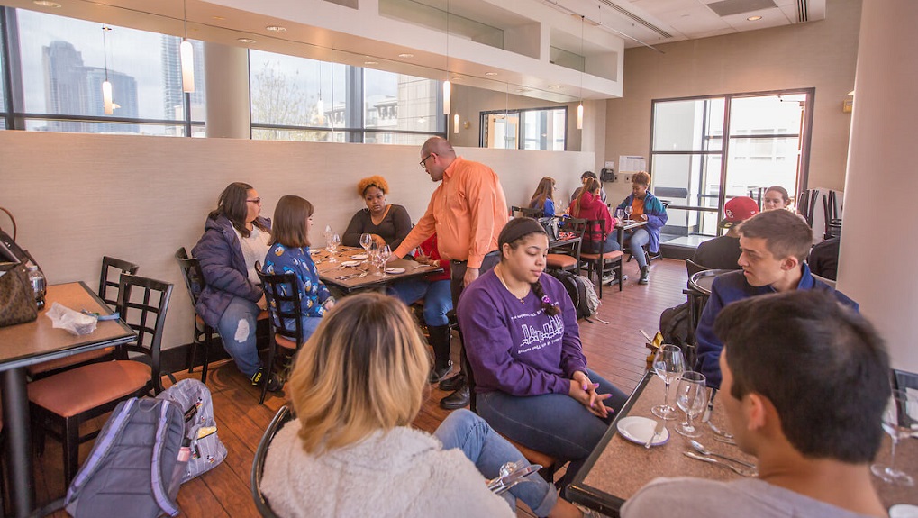 Students sitting in a dining room