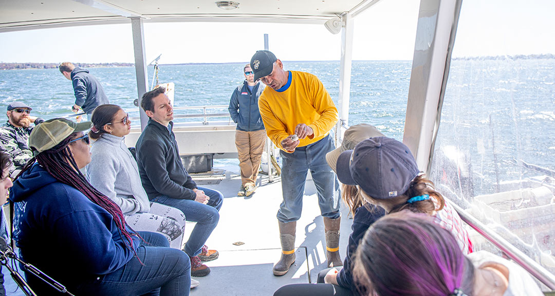 students on Narragansett Bay learning about sustainability from Jody King