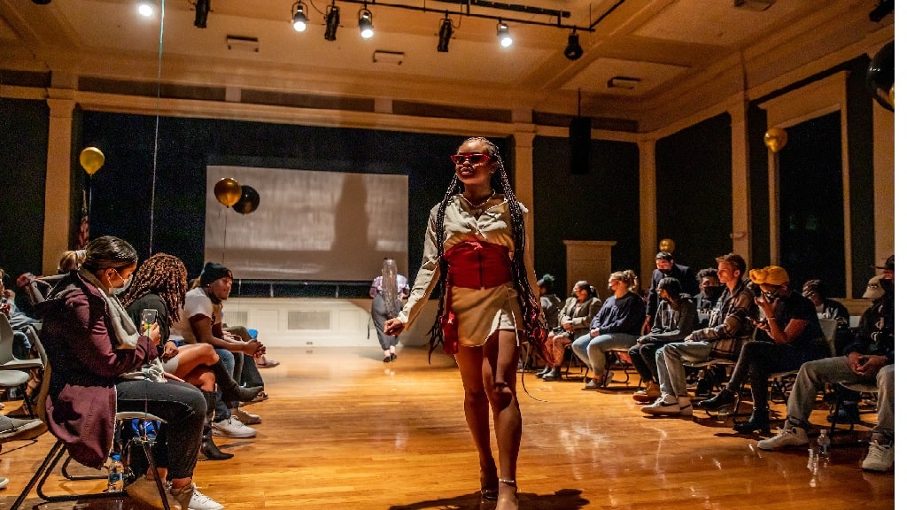 student walking in a fashion show