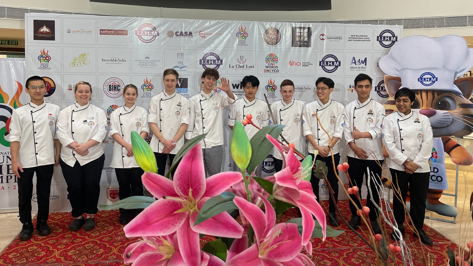 Group photo of the Top 10 Young Chef Olympiad contestants, including JWU student Chentelle Gonsalves (third from left).