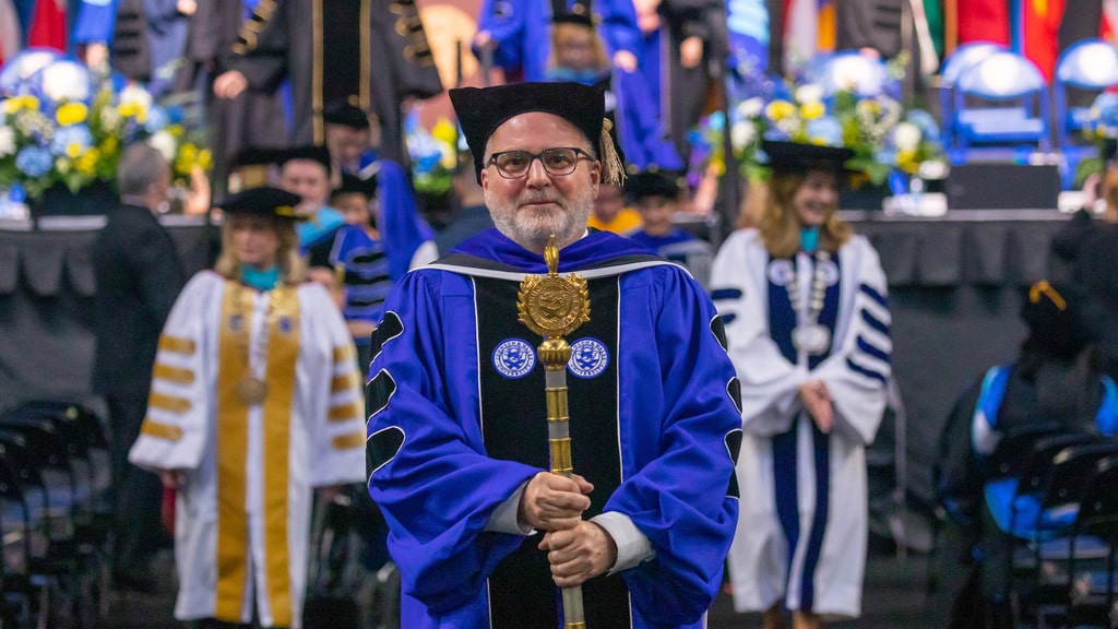 Provost Rich Wiscott, Ph.D. in his graduate regalia.