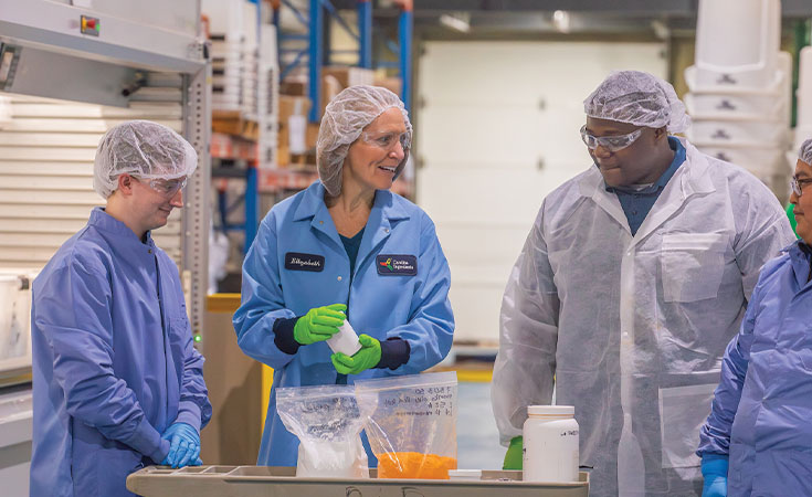 A group of JWU students at an off-site internship getting hands on experience.