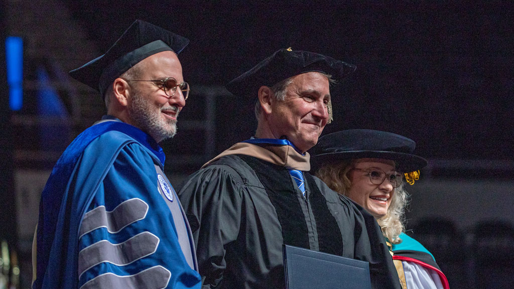 Provost Richard Wiscott, Ecolab Executive VP Greg Cook and Chancellor Mim Runey.