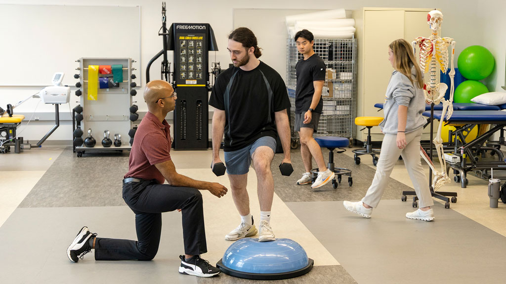 Student Siddharth Koka '27 and Anthony Lancellotti '27 practicing exercises for balance