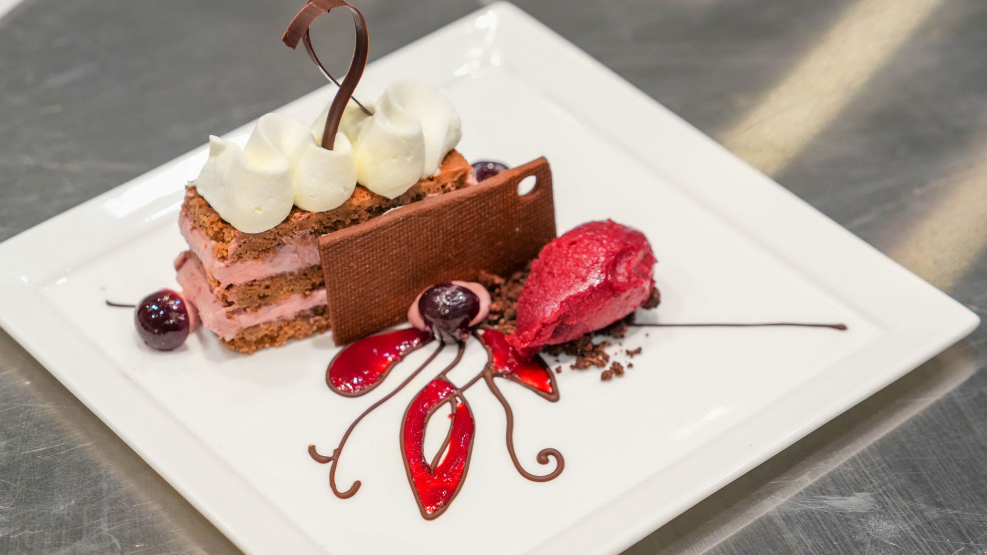 Milk chocolate sponge cake with cherry and kirsch cru00e8me Parisienne by Max Astacio '27.