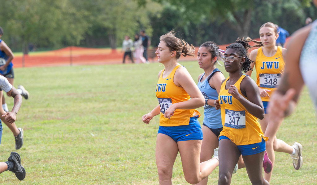 Runners from the Charlotte Women’s Cross-Country team during their October race. 