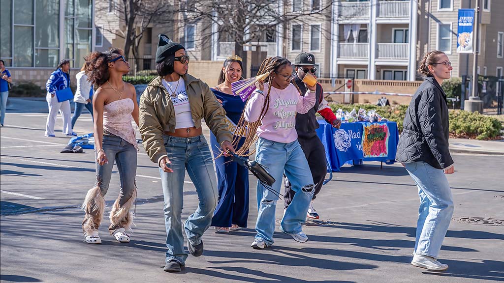 Students doing a step dance