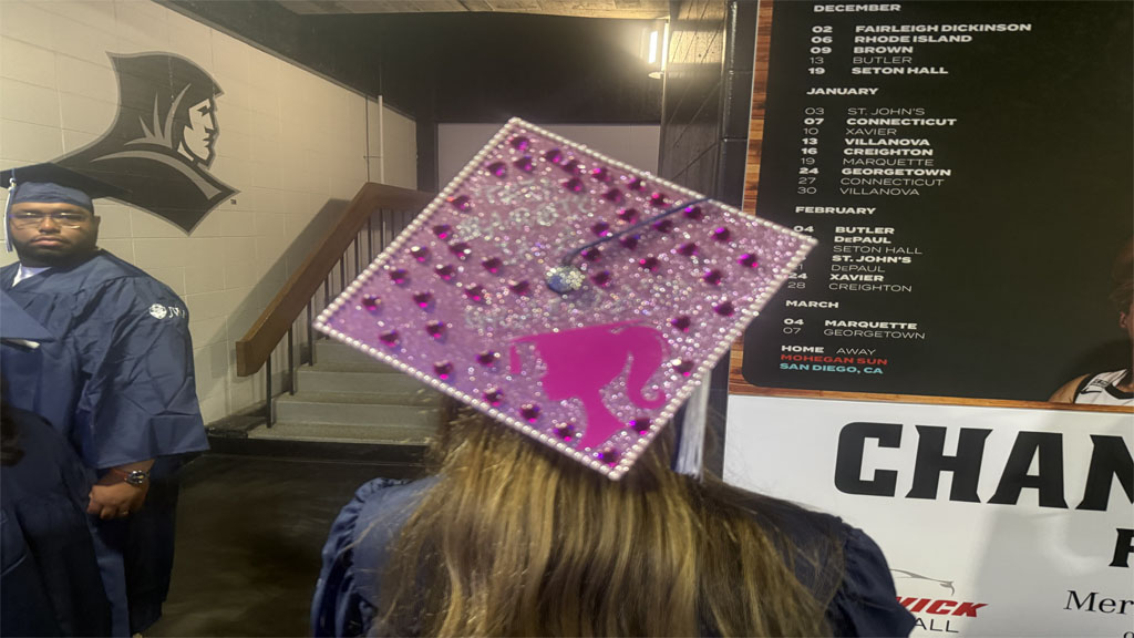 Amelia Marten showing barbie themed grad cap