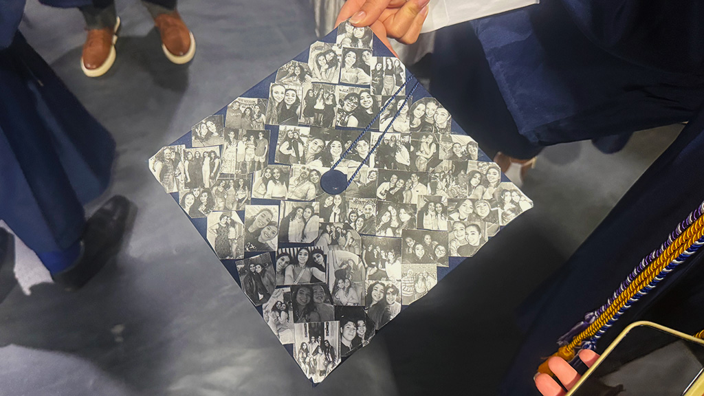 Anna Countouroudas shows memory decorated grad cap