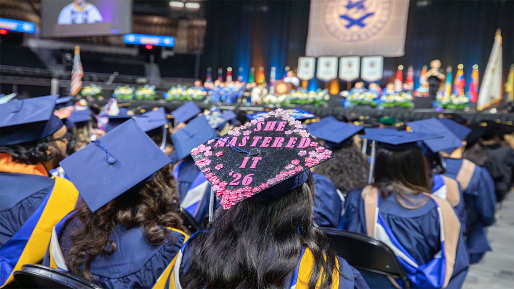 She mastered it grad cap