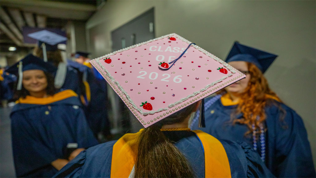 Strawberry themed grad cap with graduation year