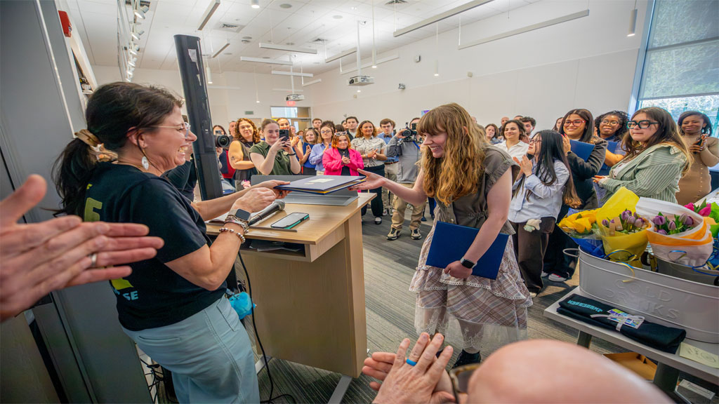 Student receiving design award
