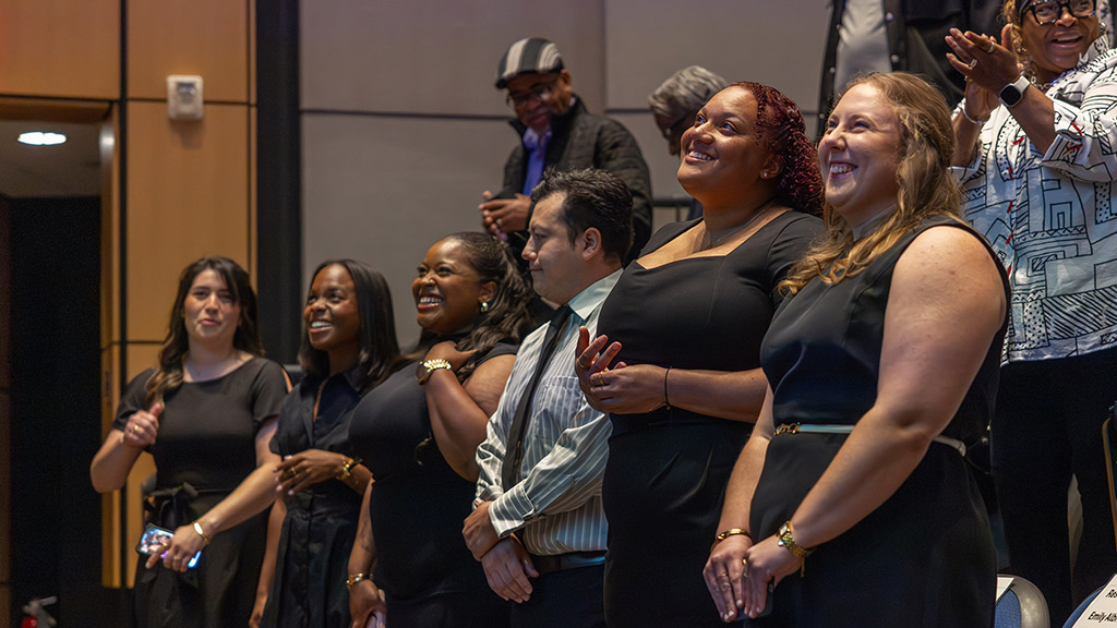 candid photo of JWU Charlotte ABSN graduates in audience