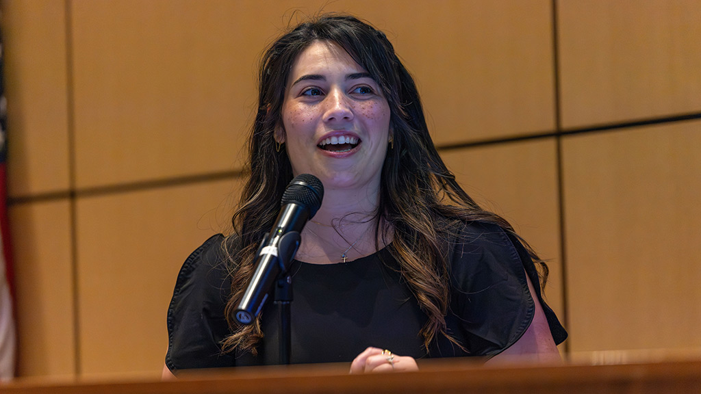 JWU Charlotte ABSN student speaker Jesselyn Posada at the podium