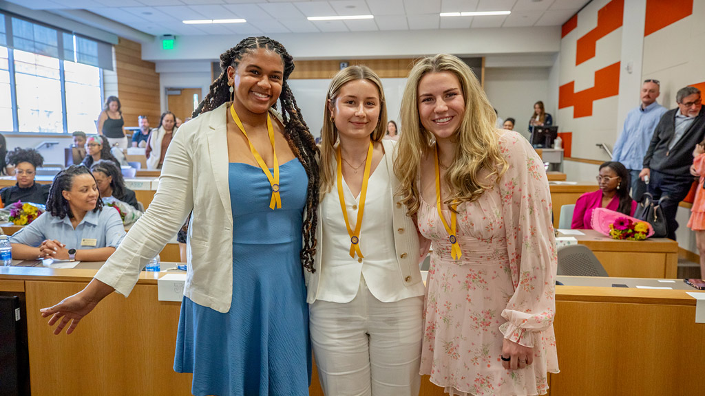 the three Class of 2026 ABSN graduates at JWU Providence