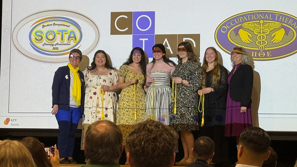 OTD Class of 2026 Phi Theta Epsilon members pose with their cords
