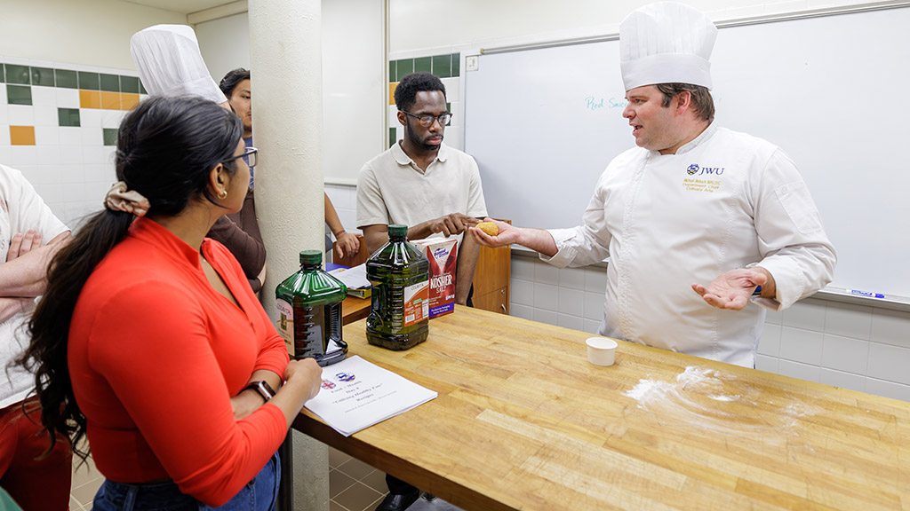 Associate Professor Makuch and Brown medical students in a lab