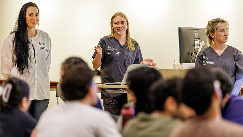 two MSCND students present in a classroom