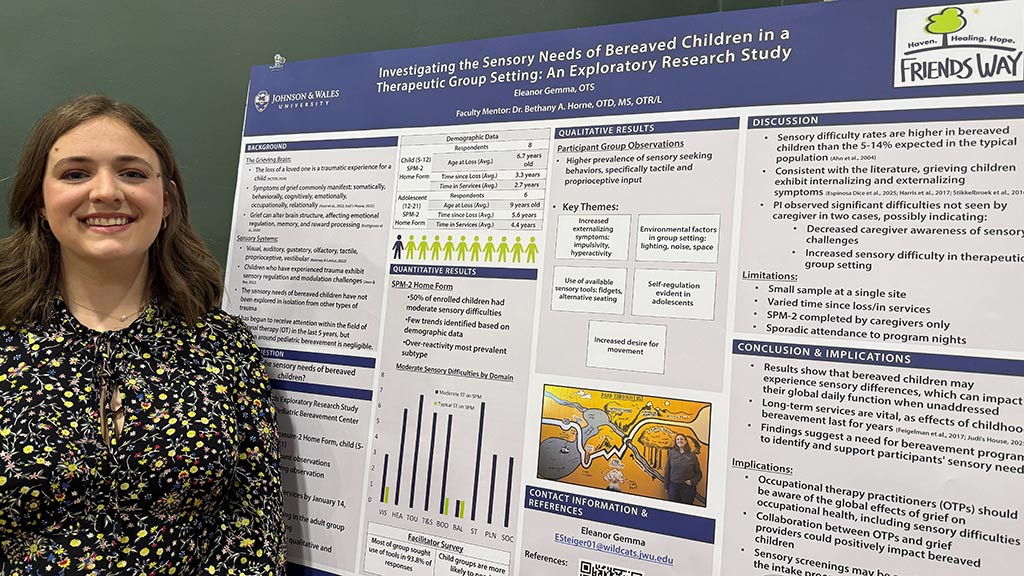 Eleanor Gemma '26 OTD with her capstone poster