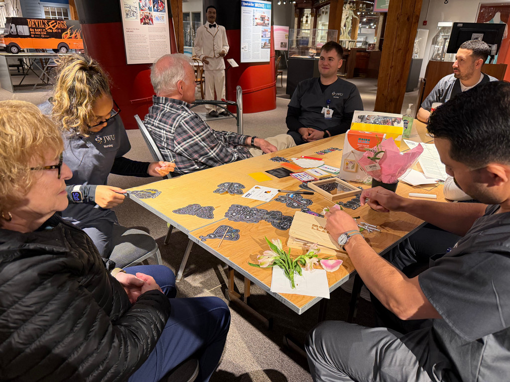JWU students offer respite care for dementia patients at an event in May 2026.