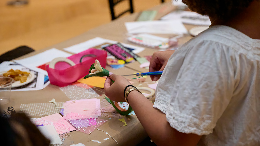 person making craft flower for RISD Guild collage event