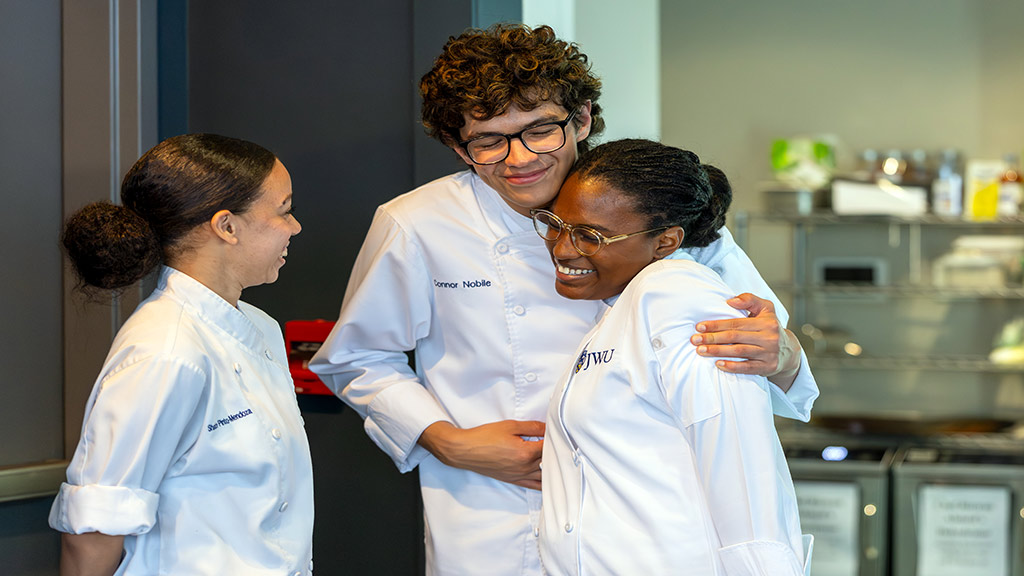 Johanna Evans Hugging Classmates