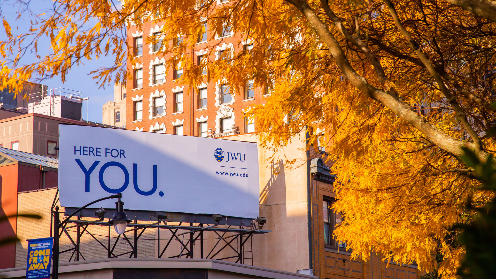 In this Together: JWU Here for you billboard